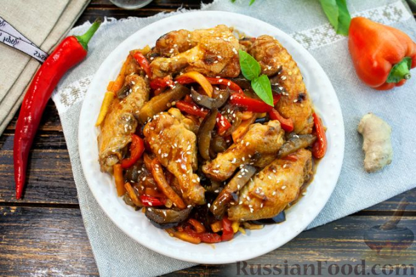 Куриные крылышки с овощами в кисло-сладком соусе