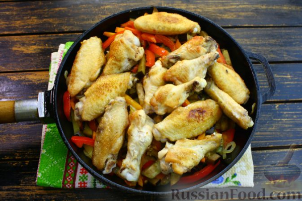 Куриные крылышки с овощами в кисло-сладком соусе